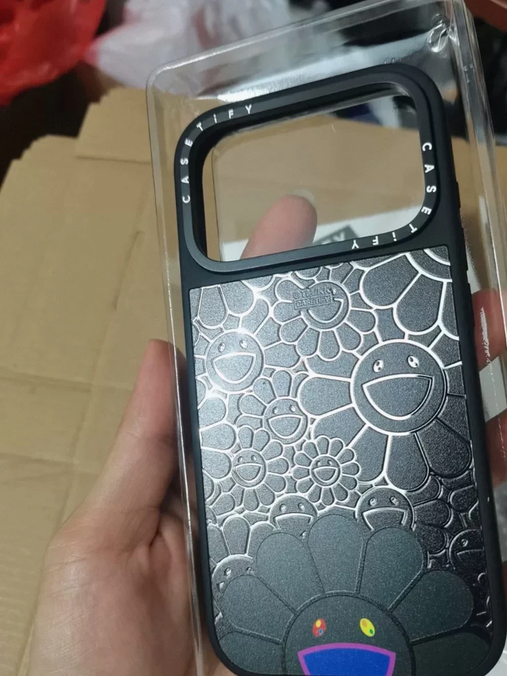 Casetify Black Embossed Smiley Flower Phone Case with Color Accent